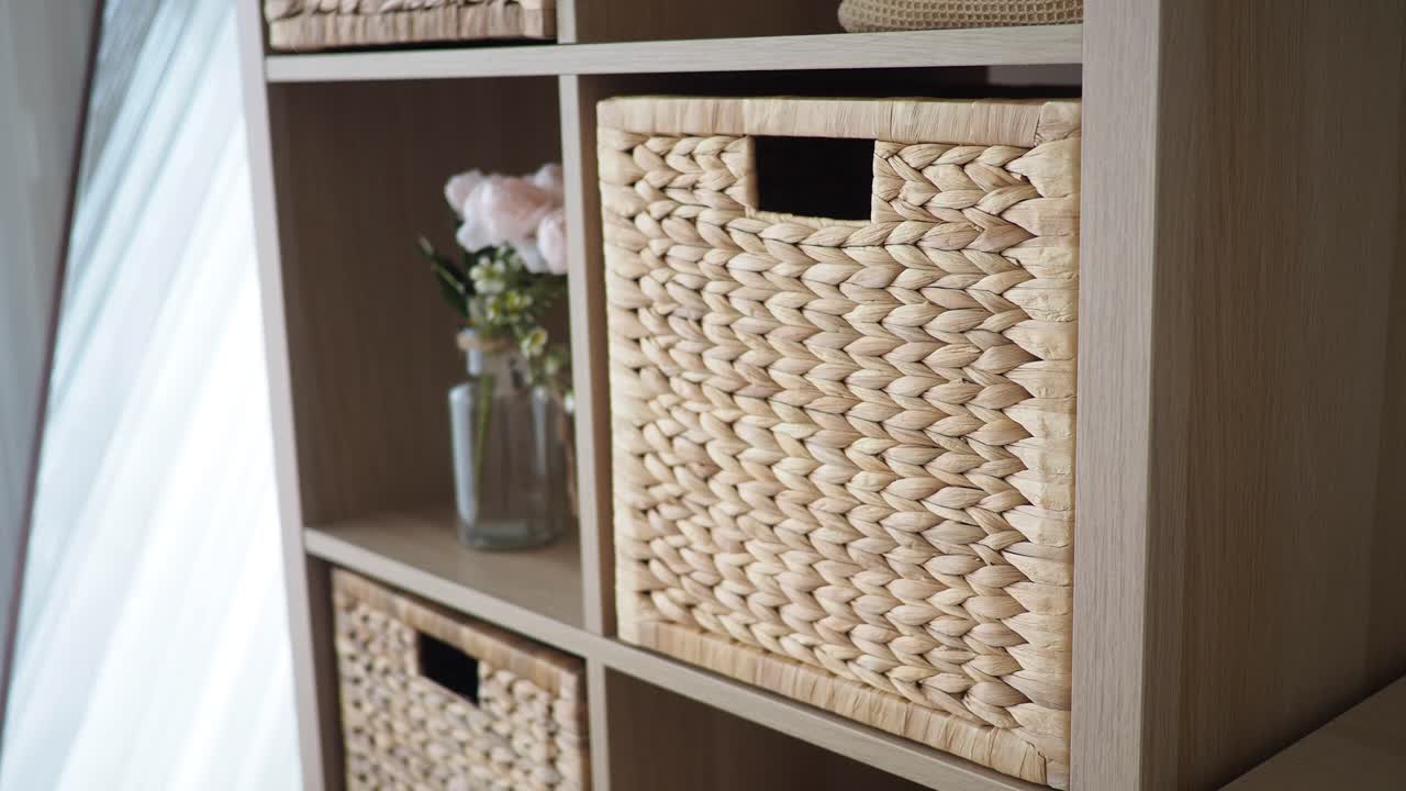 Storage Solutions with Woven Baskets and Decorative Flowers