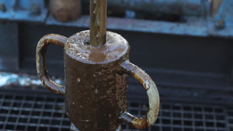 Slow-motion-of-polishing-rod-moving-up-and-down-in-oil-pumpjack-stuffing-box