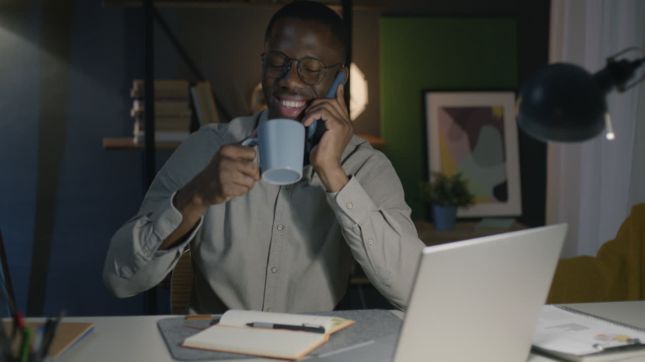 Man Working Late at Home Office