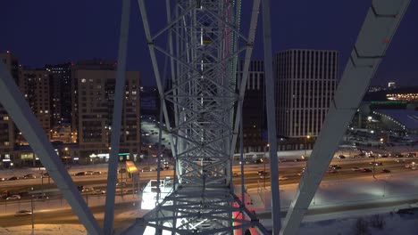 view from the inside of the ferris wheel cabin. winter night in the city kazan