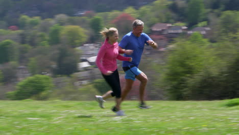 mature couple jogging in countryside shot on r3d