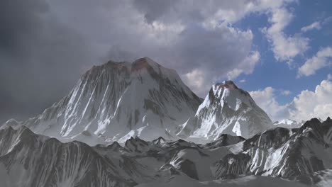 snowy mountain range under cloudy sky