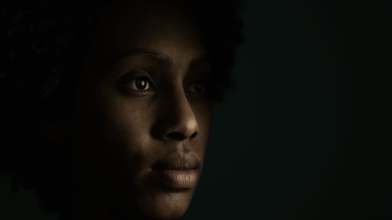 Portrait of a woman in dark lighting