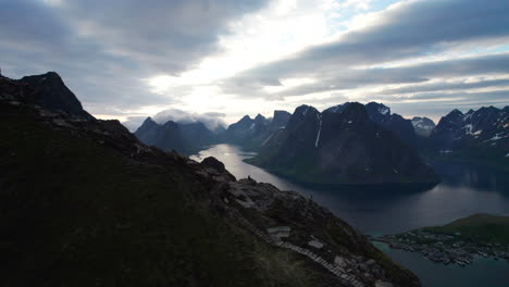 Aerial-view-of-the-Reinebringen-mountain-in-Reine,-the-steps-to-ascend-and-where-you-can-see-the-beautiful-landscape