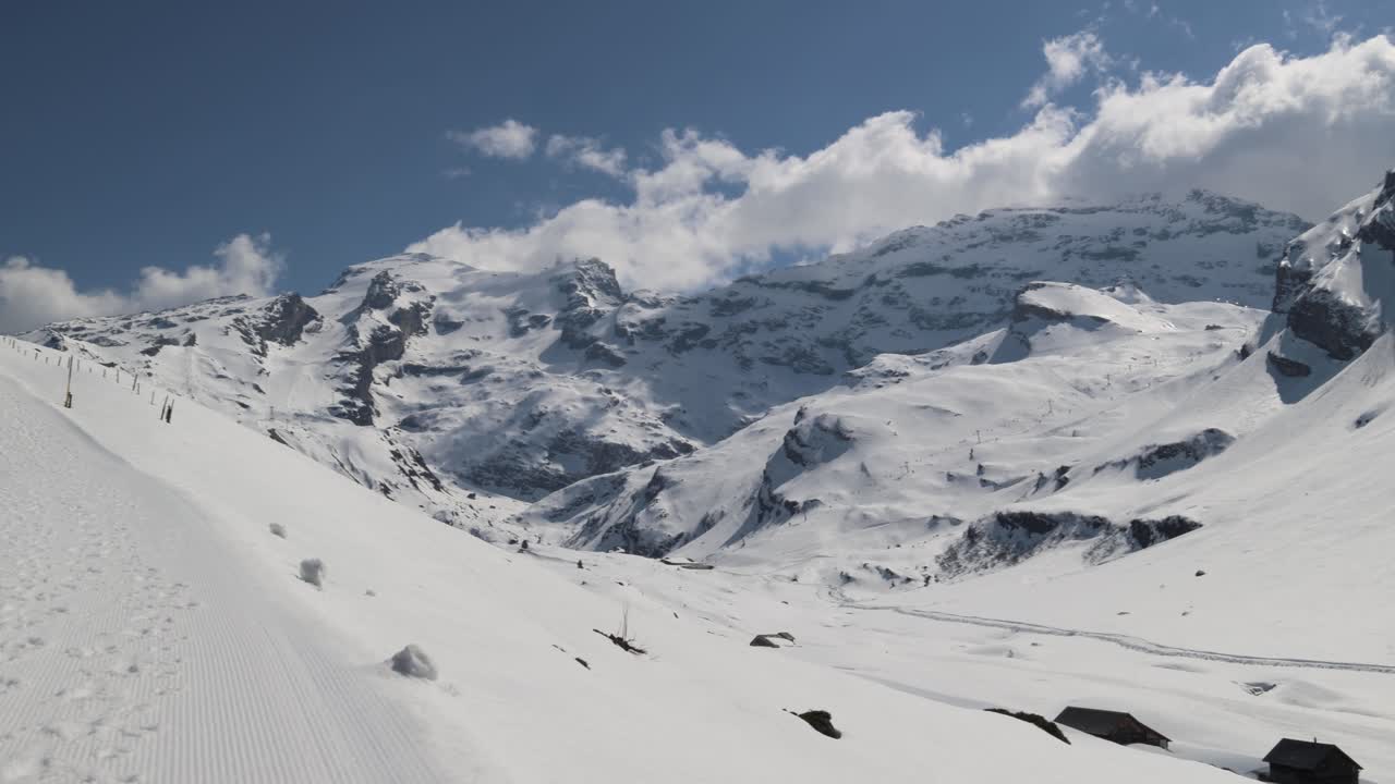 Winter mountain landscape with walking path, Swiss alps