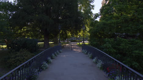 a view of bridge and riverwalk in bade-baden village, baden baden, germany