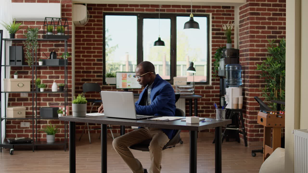Financial analyst looking at business report documents