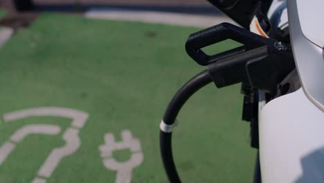 electric vehicle charging at a charging station