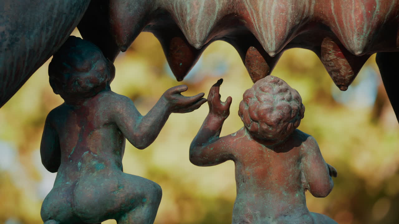 Chisinau, Moldova - September 25, 2025: Historic bronze statue of the Capitoline Wolf with Romulus and Remus on a red marble pedestal in front of the National History Museum of Moldova