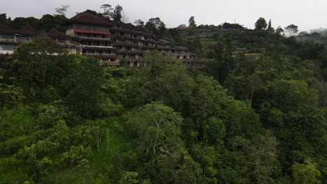 ruins of ghost palace hotel at the highlands of bedugul, bali island, indonesia