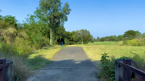 a peaceful walk through a golf course