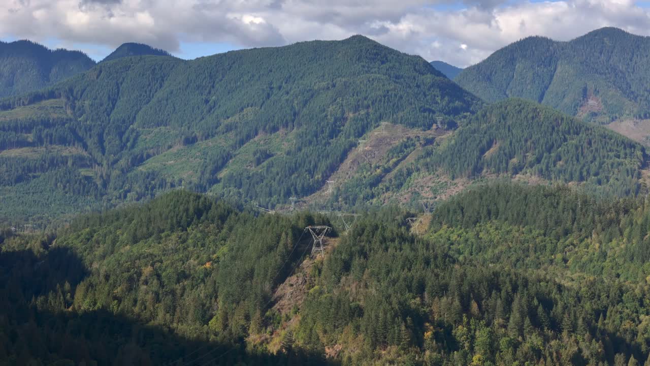 Hope's Powerlines Majesty: Aerial View of Iconic Structures Amidst Natural Beauty