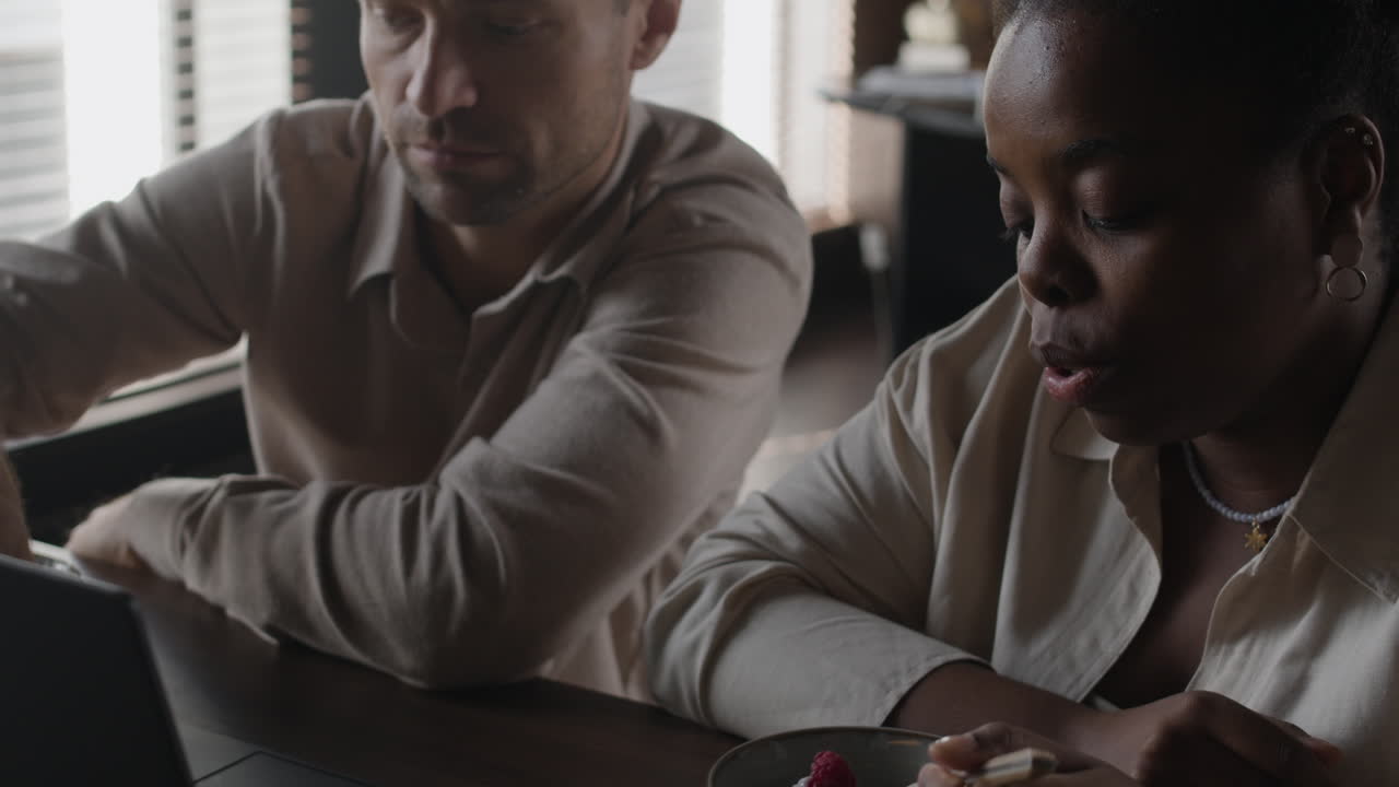 People eating food at a table