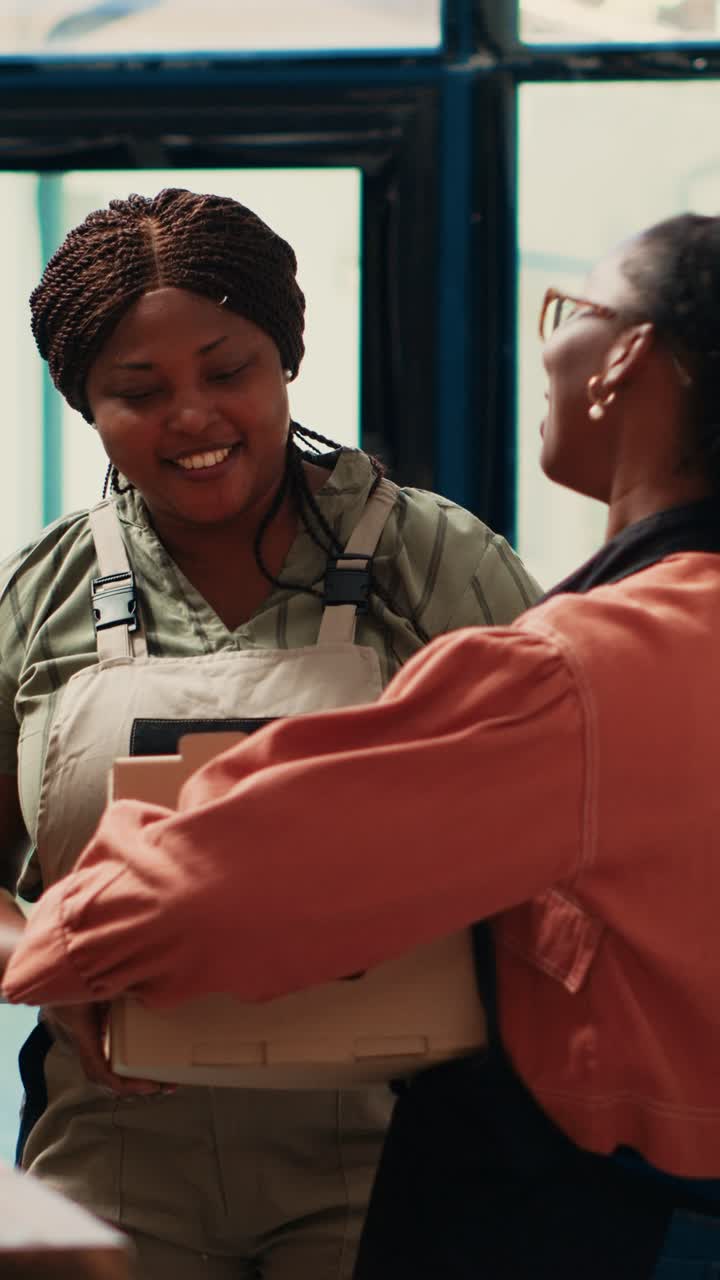 Vertical Video Local vendor receiving merchandise from farming supplier