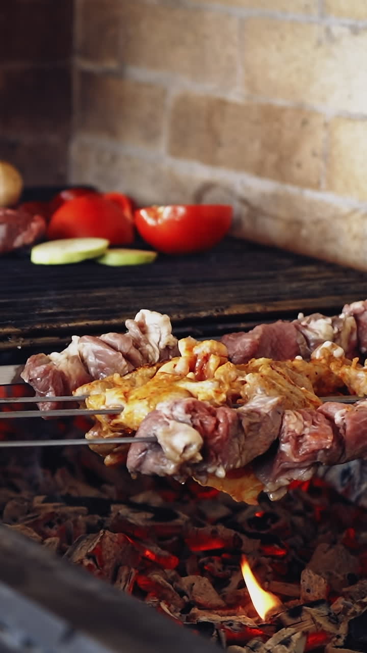 Cooking meat on fire. Grilling marinated meat on grill