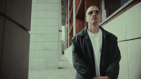man walking in urban setting