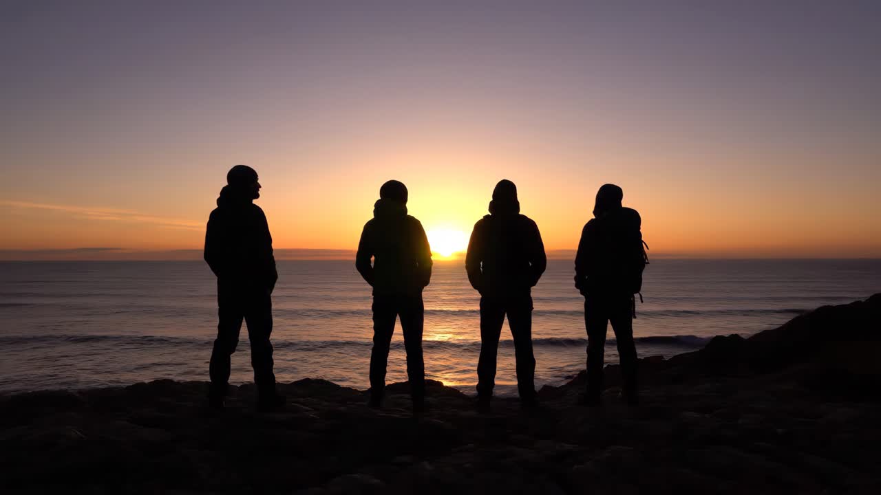 Silhouettes at Sunrise by the Ocean