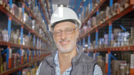 statistical data processing over portrait of caucasian senior male supervisor smiling at warehouse