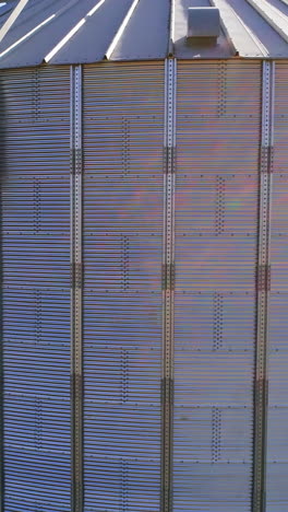 granary grain elevators. metal tanks for the storage crop. large bins for farming. vertical video