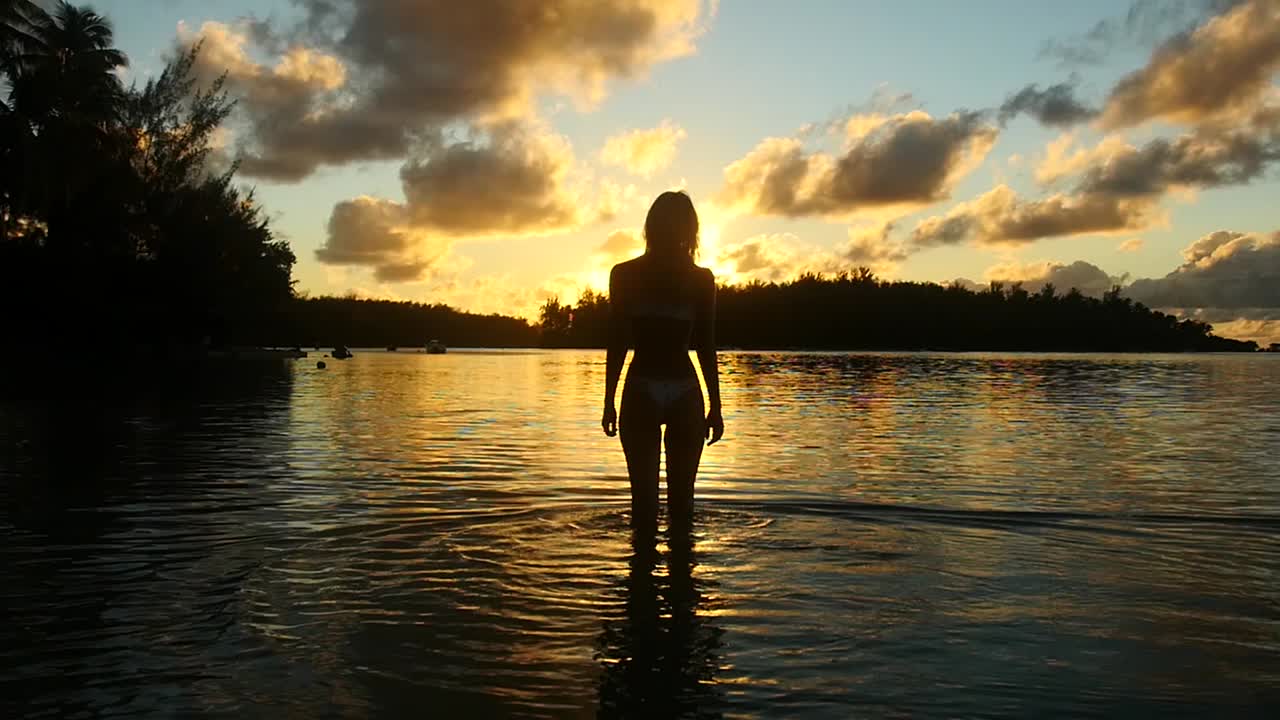 Free stock video - Girl standing in the water during sunset in french ...