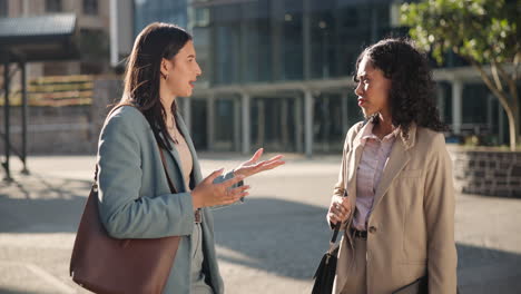 businesswomen in conversation