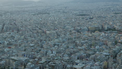 dense urban sprawl from above, showcasing athens' cityscape at dusk