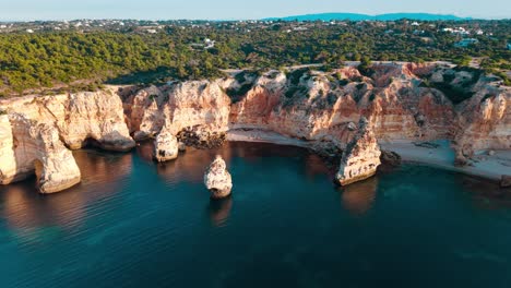 stunning aerial view of cliffs and coastline in portugal's algarve region