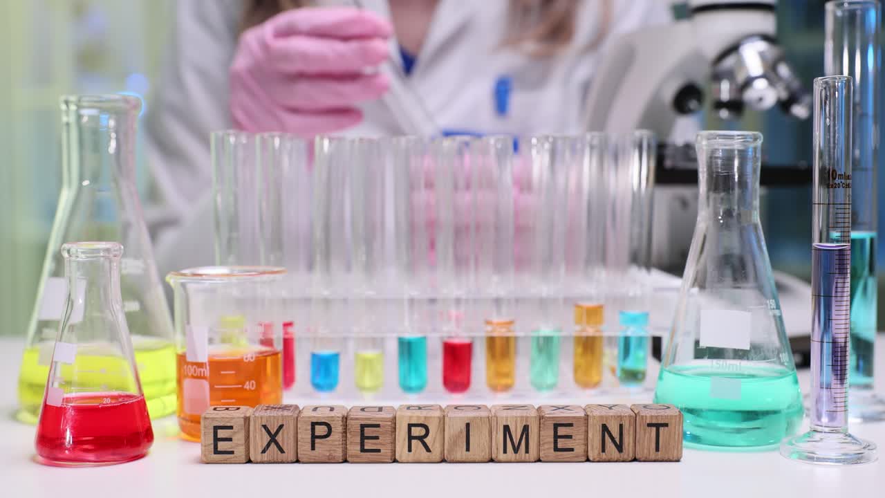 Word Experiment with Lab Equipment and Scientist Working