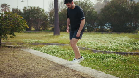 Leg Warm Up Of An Athlete In The Park Under The Sun