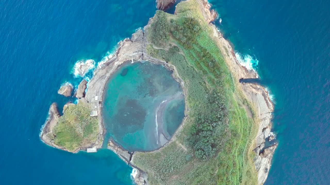 Aerial and vertical drone footage of a tropical island located in Sao Miguel, Azores.