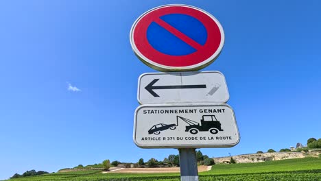 vineyard landscape with traffic sign in foreground