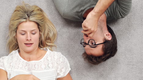 young couple eating chocolate