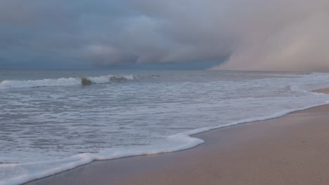 foaming wave of sea on shore