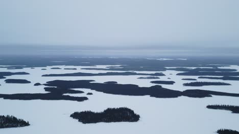 establishing drone shot paint lake provincial park frozen islands northern manitoba canada