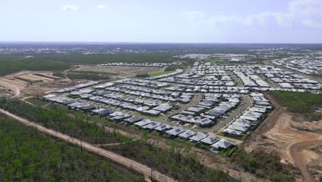 High-drone-shot-of-a-newly-built-suburb