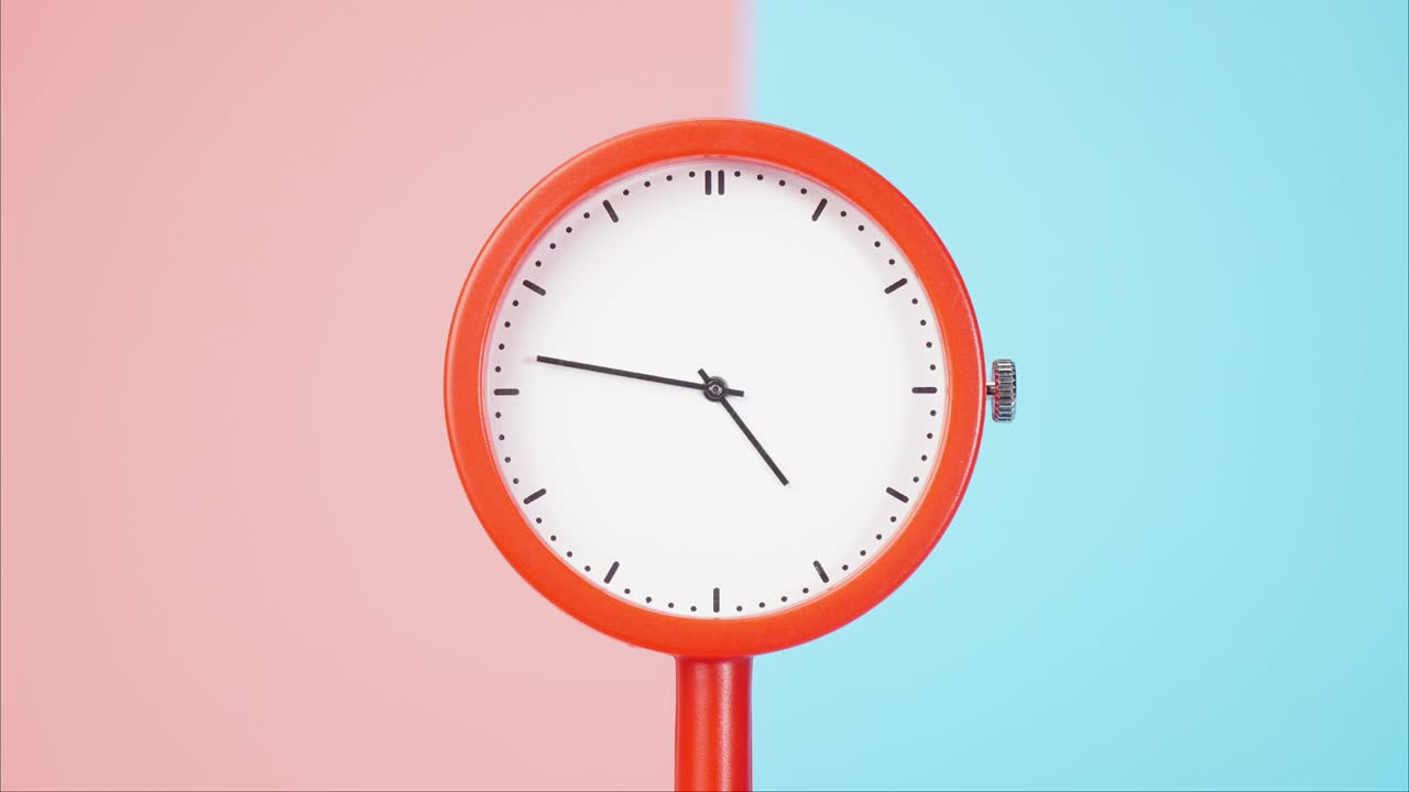 Time lapse, Orange  clock shows the running of time.