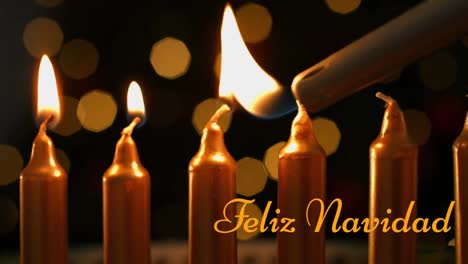 animación de texto de feliz navidad sobre velas