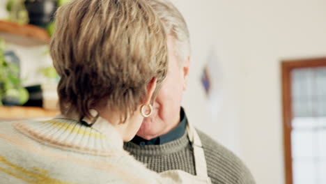 Love,-dance-and-old-couple-in-kitchen-in-home