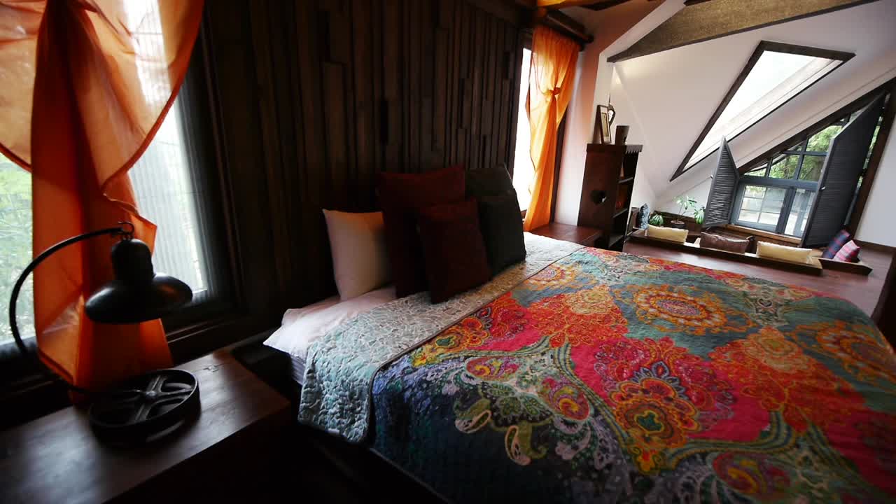 Vintage looking bed for romantic couple in tiny home style architecture