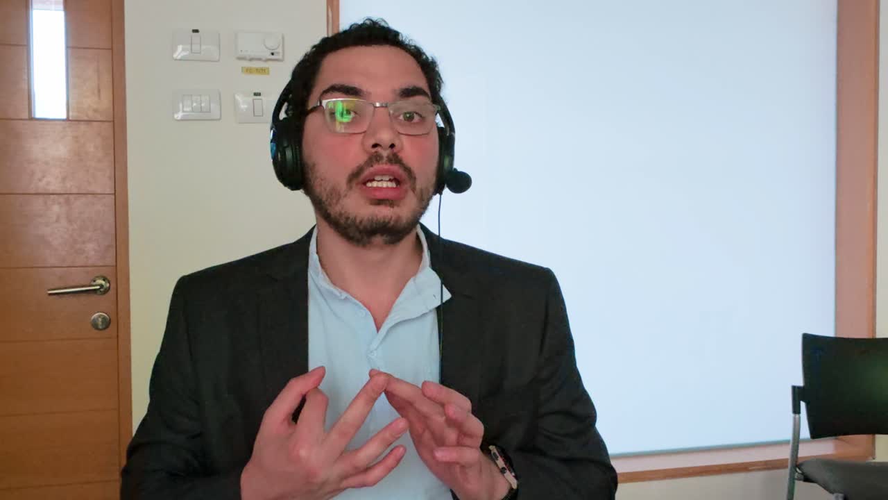 Young Entrepreneur Pitching a Startup Idea