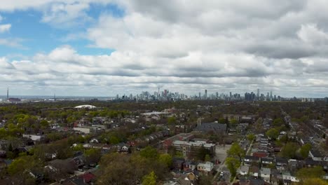 Aerial-shot-flying-towards-Toronto-during-the-spring-time-in-a-nearby-neighborhood