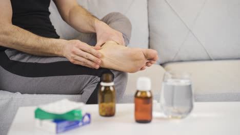 male foot with fungal infection with itching and redness of the feet.