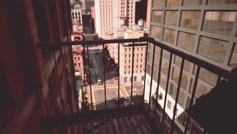 a view of a city from a fire escape