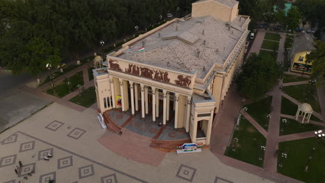 exterior of music and drama theatre, khujand, tajikistan - aerial pullback