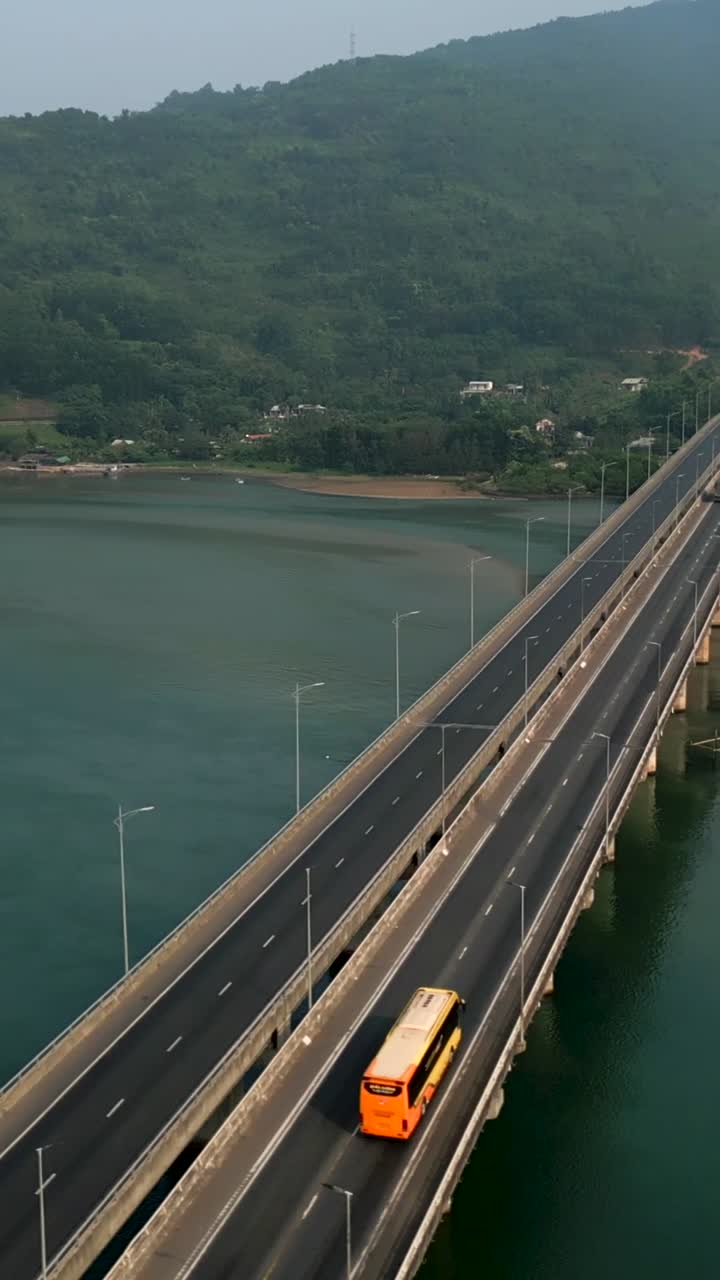 Aerial view of a bridge with vehicles crossing it