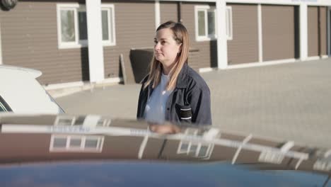 car service manager walking around office