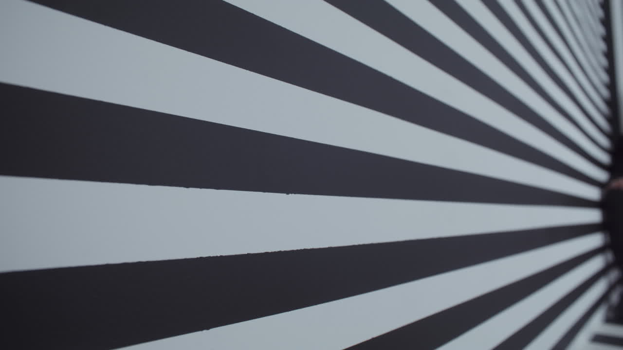 Man wearing VR headset in optical illusion room