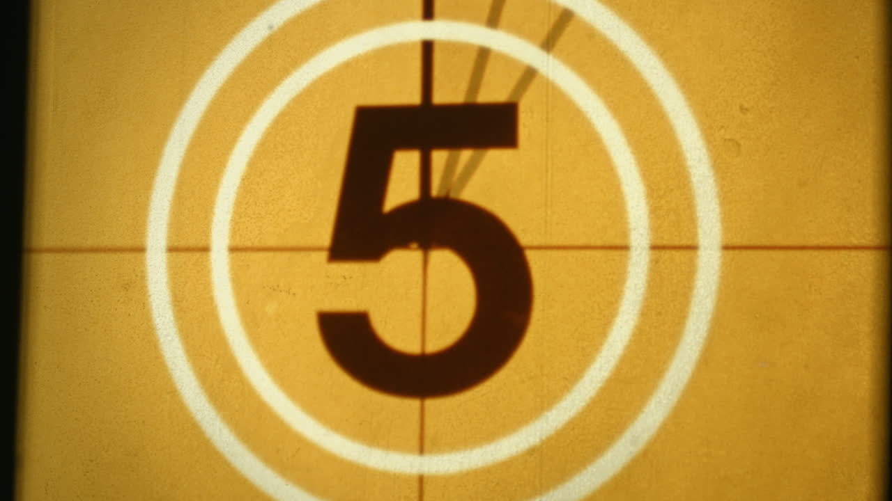 Vintage Film Countdown Leader with Numbers and Changing Colors