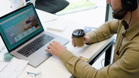 man working in a travel agency