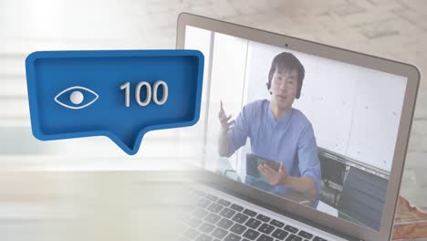 digital bubble icon with numbers growing over man on laptop.